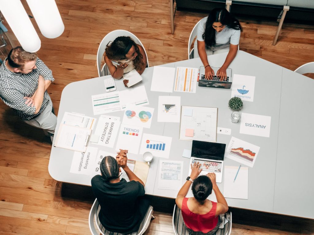 How Long Does SEO Really Take? A Realistic Timeline For Startups 2 Photo by Kindel Media: https://www.pexels.com/photo/people-in-the-office-discussing-a-project-7688336/